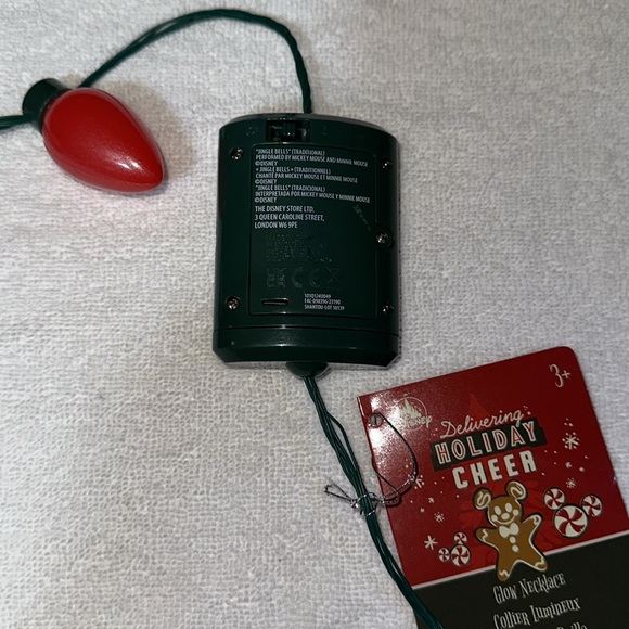 DISNEYPARKS EXCLUSIVE HOLIDAY GLOW LIGHT UP ANIMATED SINGING EARS NECKLACE NWT - Picture 8 of 10